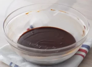 cream mixture over the chopped chocolate